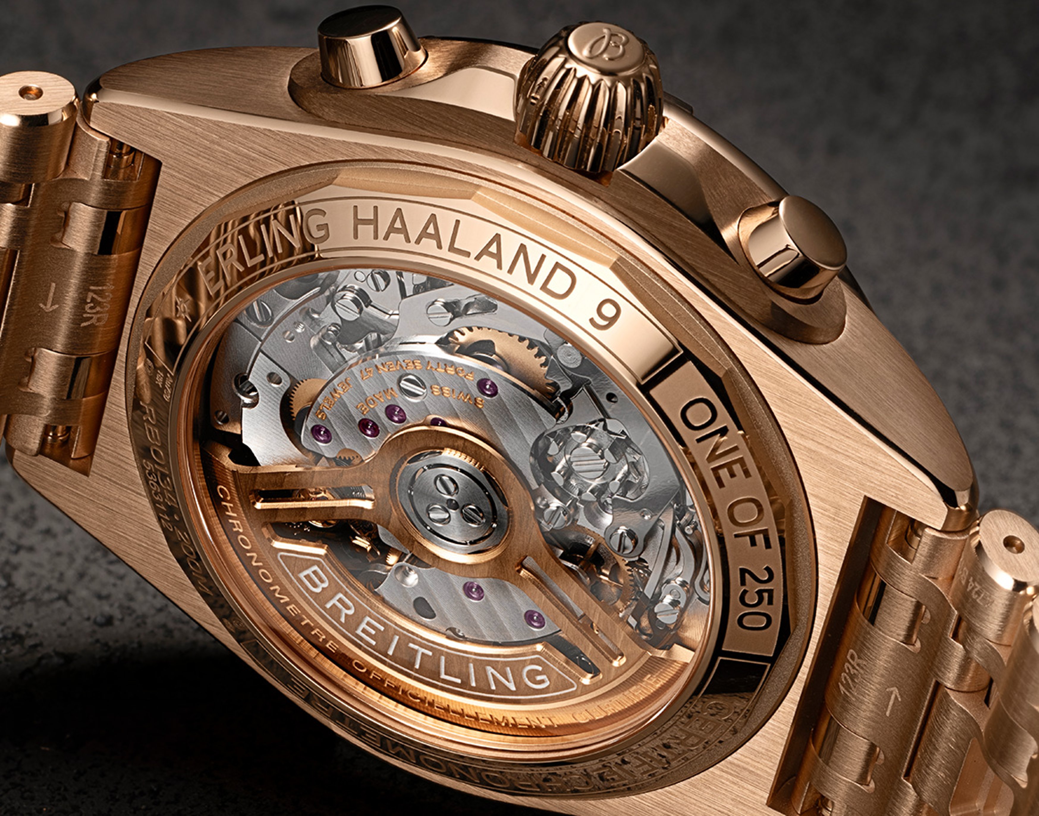 {generated} Erling Haaland’s Breitling Chronomat shown in rose gold on technical drawings, highlighting its refined chronograph design