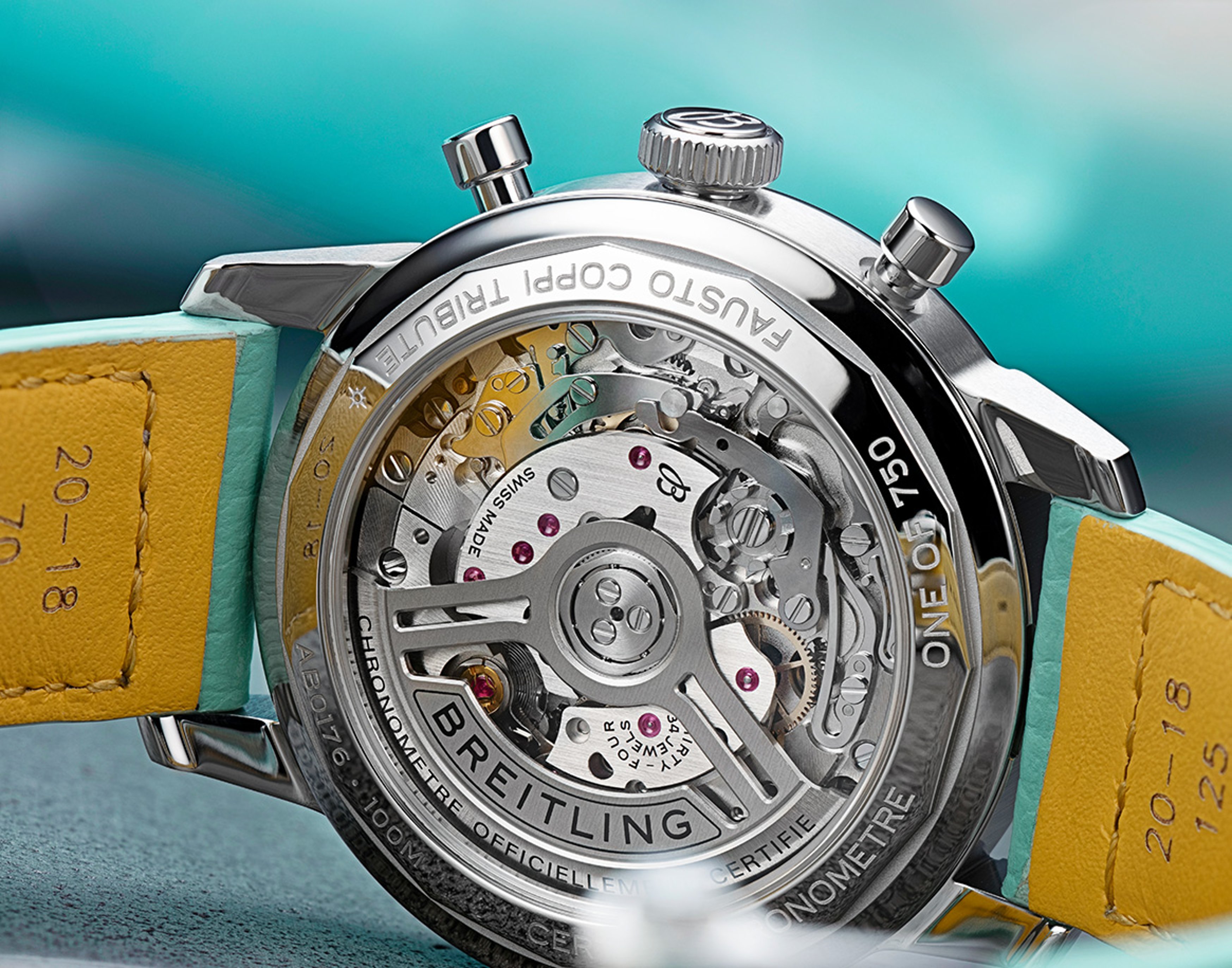 {generated} Breitling Bartali Tribute watch caseback showing exposed automatic movement and limited-edition engravings on leather strap.