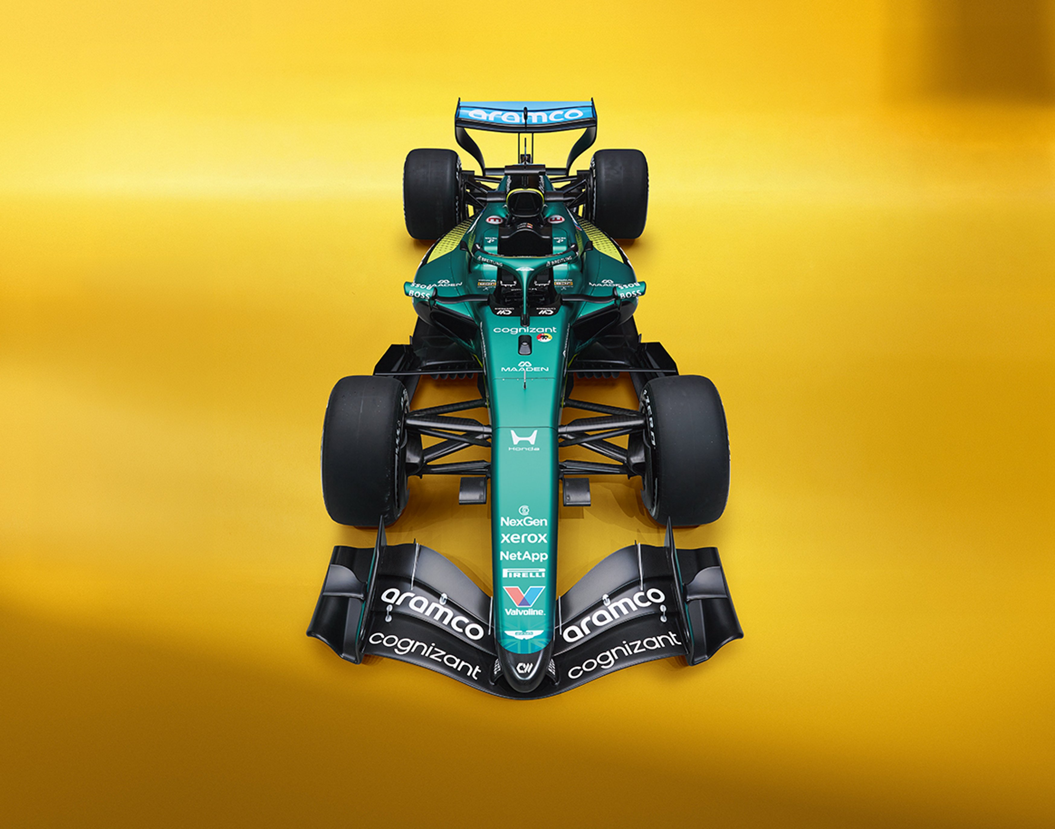 {generated} Breitling Navitimer for the Aston Martin partnership shown on a vivid yellow backdrop with a sporty black strap