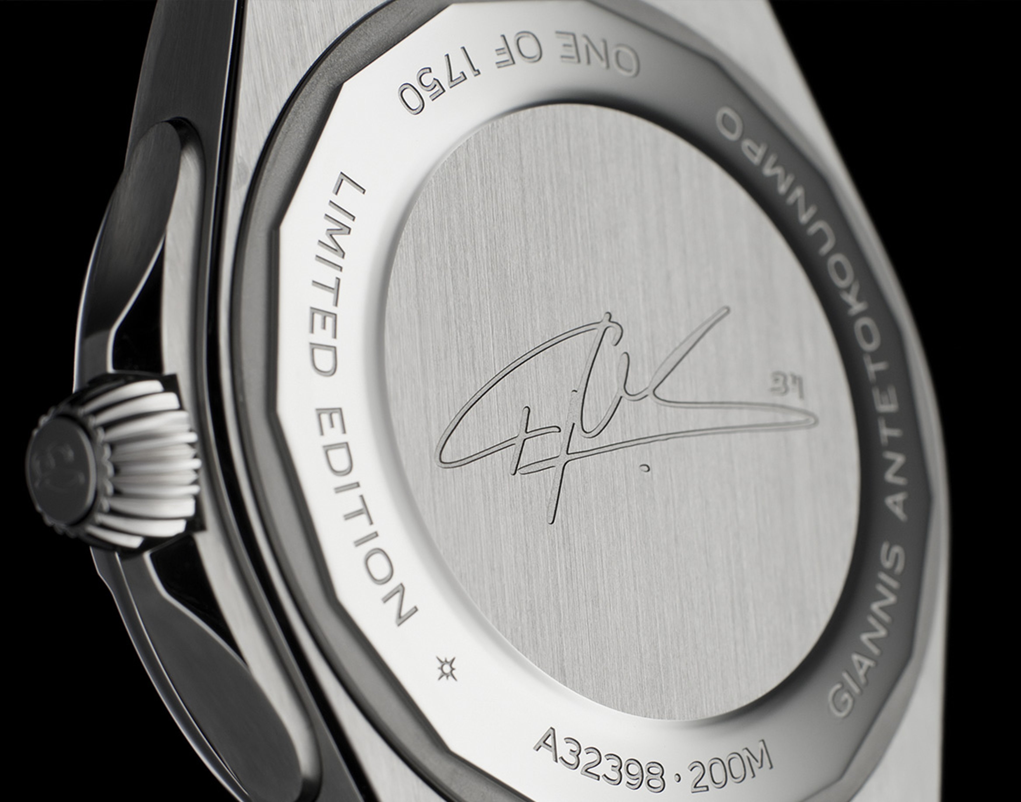 {generated} Breitling limited‑edition caseback with Giannis Antetokounmpo’s engraved signature and precise model markings in steel