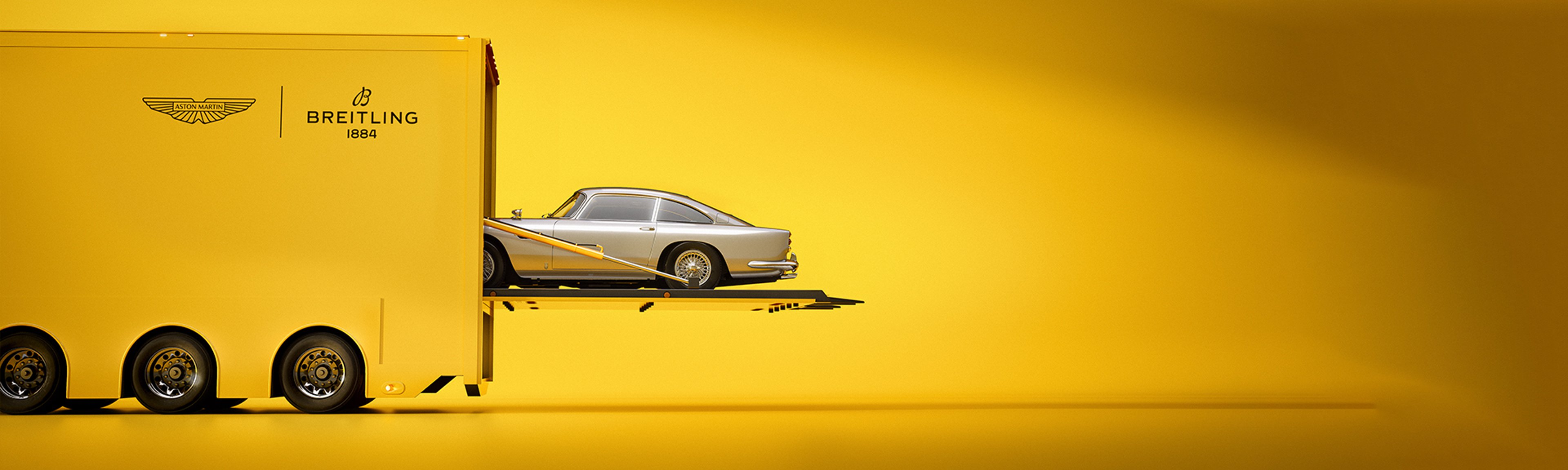 {generated} 灰色優雅的Aston Martin置於深色棚景中，展現與Breitling的精緻合作