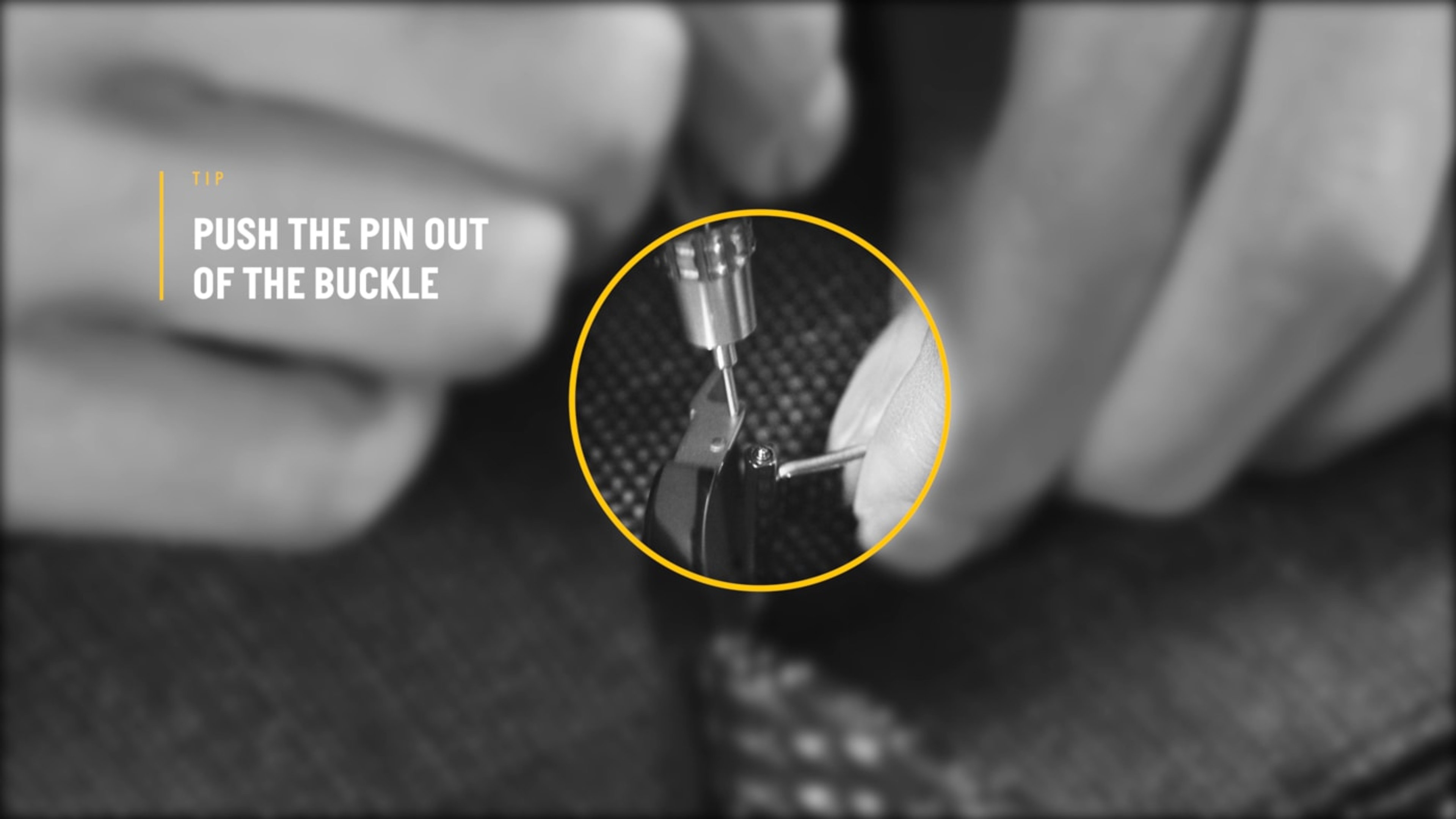 {generated} Close-up hands using a tool to push a pin from a Breitling metal buckle, highlighting precise strap adjustment steps.