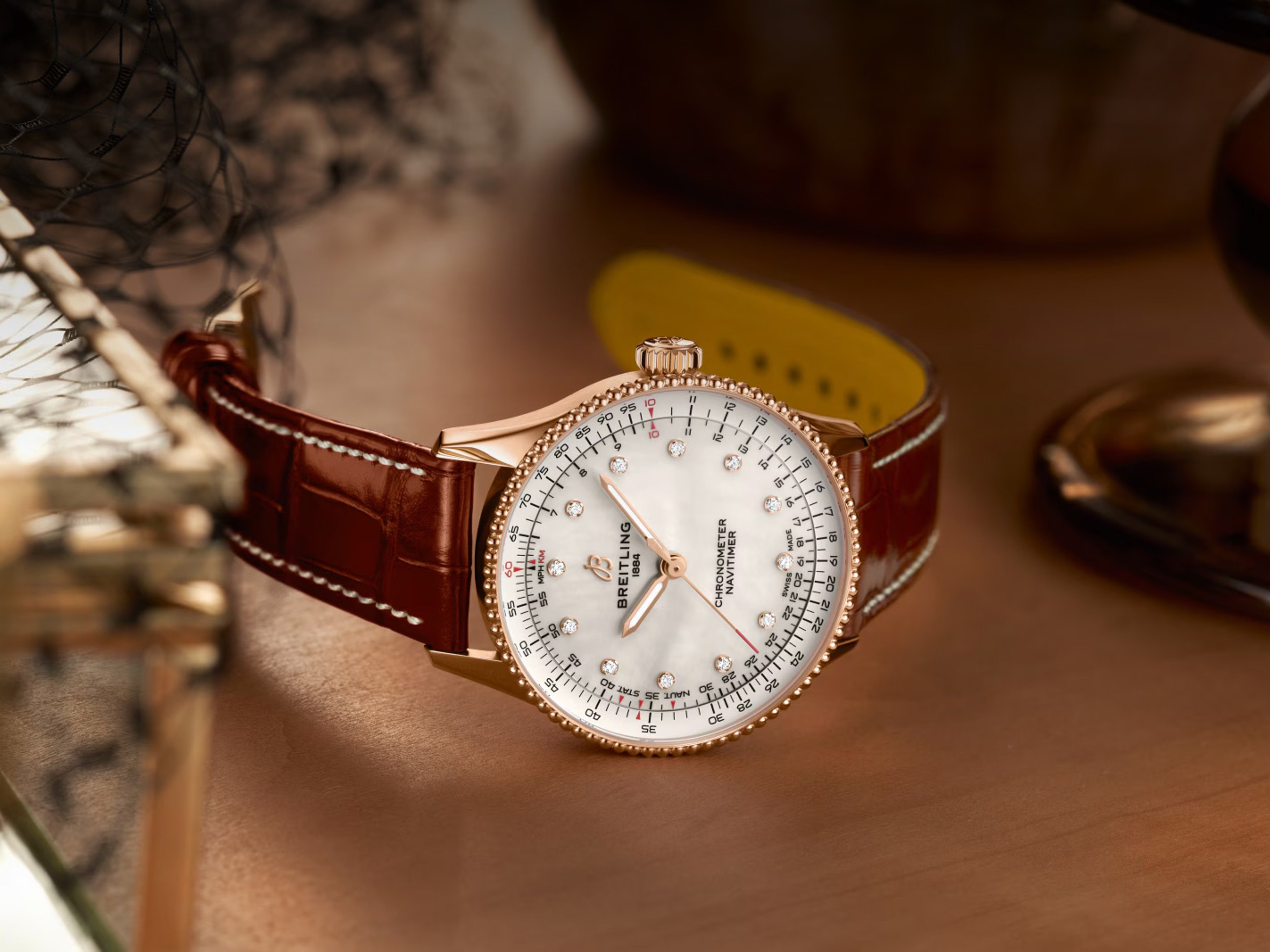{generated} Breitling Navitimer with diamond markers and brown alligator strap displayed on a warm surface highlighting its elegance