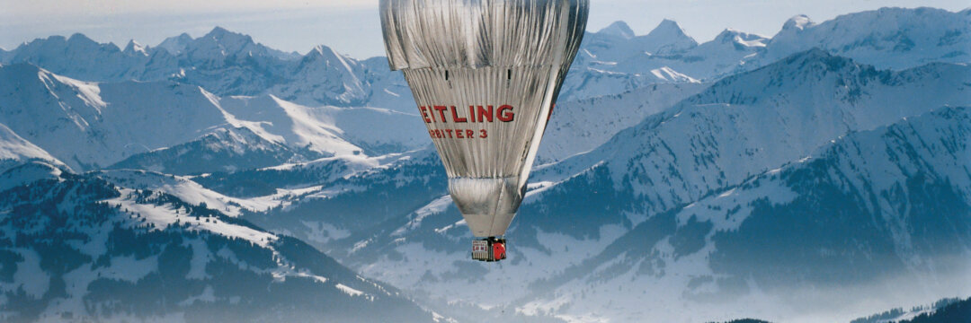 Breilting Orbiter 3 ballon over the Swiss alps