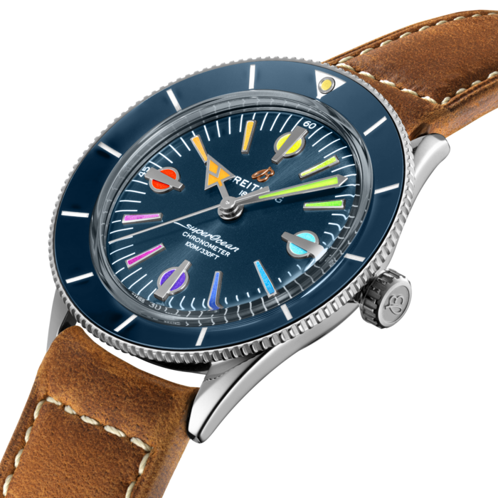 The Superocean Heritage ’57 Capsule collection pays tribute to the original 1957 SuperOcean and the cool, laid-back surfing lifestyle of the 1960s. This colorful variation comes in a limited edition of 1000 pieces.
The 42 mm stainless-steel case features two signature elements of the original SuperOcean: a concave bidirectional ceramic bezel and a dial featuring oversized indices. Paired with a mesh bracelet or a gold brown calfskin leather strap that fits both a stainless-steel pin or folding buckle, this colorful Superocean Heritage ‘57 is powered by the Breitling Caliber 10, a COSC-certified chronometer.
