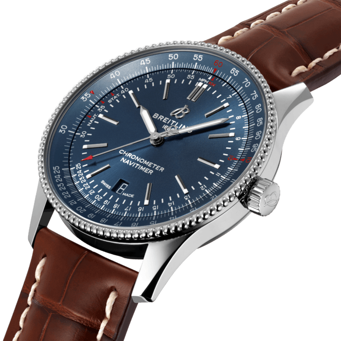 Refined and elegant, the Navitimer Automatic 41 combines the historic appeal of a true icon with the sophistication of a contemporary timepiece.
Available in a variety of materials including stainless steel and 18k red gold, the 41 mm case features a beaded bezel and a range of elegant dial colors. Offered either with a matching bracelet or alligator strap that fits both a stainless-steel pin or folding buckle, the Navitimer Automatic 41 is powered by the Breitling Caliber 17, a COSC-certified chronometer.