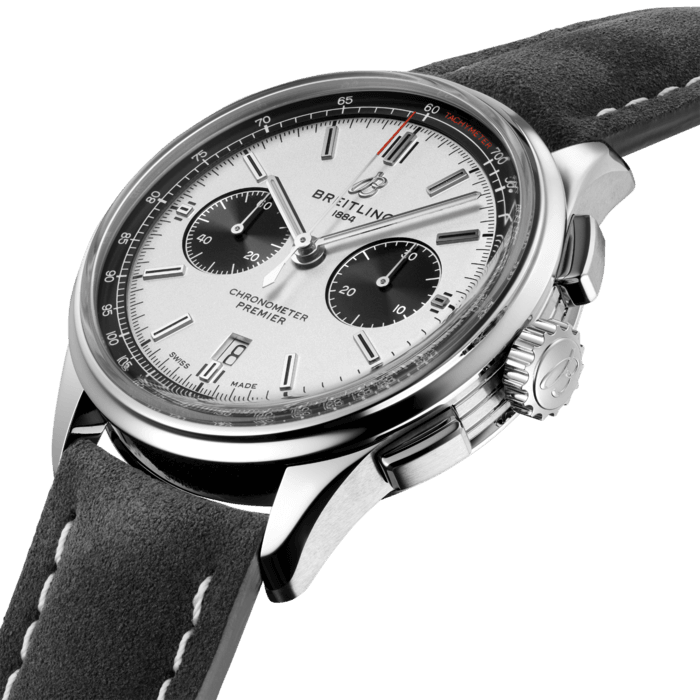 Designed by Willy Breitling in the 1940s, the Premier was the brand’s first-ever watch dedicated purely to style. Featuring elegant details and modern-retro touches, this reinterpretation of the Premier upholds its ancestor’s reputation as “a watch of impeccable taste.” On top of its rectangular chronograph pushers and bi-compax chronograph panda look, the Premier displays a variety of elegant design details such as grooves on the case-side and open sapphire caseback. The Premier B01 Chronograph 42 is available in an array of dial colors and with case materials that include stainless steel and 18k red gold. Offered either with a matching bracelet, or a choice of alligator or nubuck calfskin leather strap, this Premier is powered by the in-house Breitling Manufacture Caliber 01, a COSC-certified chronometer.