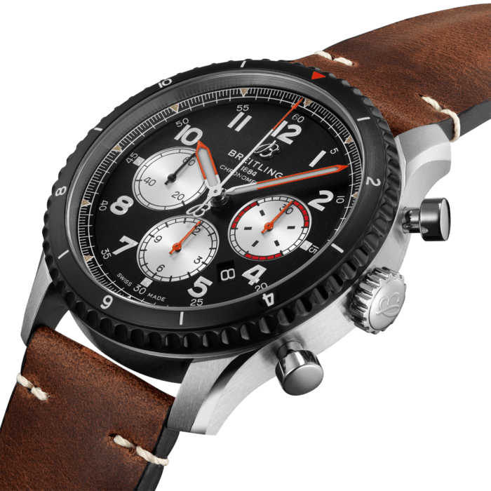 The Aviator 8 B01 Chronograph 43 Mosquito honors the De Havilland Mosquito, a British aircraft whose lightweight wooden construction made it one of the fastest planes in the skies during World War II. Mostly made of wood, the De Havilland Mosquito was a British aircraft that served in a variety of roles. Built between 1940 and 1950, the so-called “Wooden Wonder” was one of the fastest planes in the world – in fact, thanks to the wooden construction, it flew 20 mph faster than the famous Spitfire, which was equipped with the same engine. The Aviator 8 B01 Chronograph 43 Mosquito is powered by the in-house Breitling Manufacture Caliber 01 movement and features a brushed DLC-coated stainless-steel bezel with white numerals and a black dial with contrasting silver chronograph counters. The eye-catching red and orange accents recall the military roundels and markings featured on the fuselage of the De Havilland Mosquito and add to the watch’s allure. The De Havilland Mosquito played a key role in the history of aviation and Breitling is proud to commemorate a true legend of flight with the Aviator 8 B01 Chronograph 43 Mosquito.