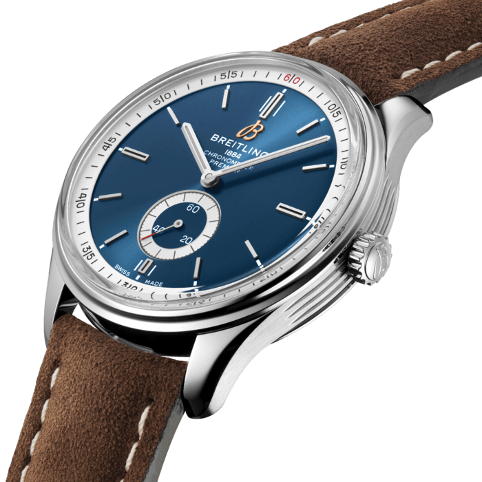 Designed by Willy Breitling in the 1940s, the Premier was the brand’s first-ever watch dedicated to style. Featuring elegant details and modern-retro touches, this reinterpretation of the Premier falls no short of its ancestors reputation: it is “a watch of impeccable taste”.
The Premier displays a variety of elegant design details such as the grooves on the case-side. Available in a variety of materials including stainless steel or 18k red gold, the Premier Automatic 40 features a range of anthracite, silver, or blue dials. Offered either with a matching bracelet, or a choice of alligator or nubuck calfskin leather strap fitting both a pin or folding buckle, this Premier is powered by the Breitling Caliber 37, a COSC-certified chronometer.