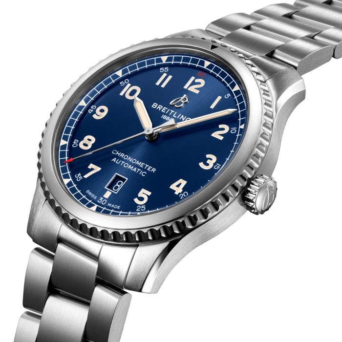 The Aviator 8 Automatic 41 makes a style statement. It is clearly a direct descendent of Breitling’s legendary watches from the 1930s and 1940s. Inside the steel case with its rotating bezel and pointer is the Breitling Caliber 17. With a bidirectional rotor winder, it delivers more than 40 hours of power reserve. The eye-catching dial is available in black or blue. The 41 mm COSC-certified chronometer has a solid screwed caseback and is available with steel bracelet or a leather strap.