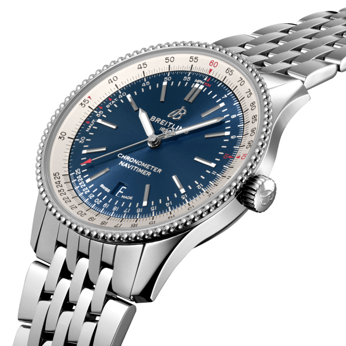 Refined and elegant, the Navitimer Automatic 41 combines the historic appeal of a true icon with the sophistication of a contemporary timepiece.
Available in a variety of materials including stainless steel and 18k red gold, the 41 mm case features a beaded bezel and a range of elegant dial colors. Offered either with a matching bracelet or alligator strap that fits both a stainless-steel pin or folding buckle, the Navitimer Automatic 41 is powered by the Breitling Caliber 17, a COSC-certified chronometer.