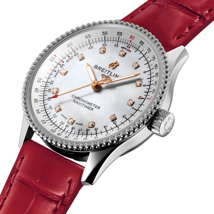 Refined and elegant, the Navitimer Automatic 35 combines the historic appeal of a true icon with the sophistication of a contemporary timepiece.
Available in a variety of materials including stainless steel and 18k red gold, the 35 mm case features a beaded bezel and a range of elegant dial colors, as well as diamond-set white mother of pearl. Offered either with a matching bracelet or alligator strap that fits both a stainless steel pin or folding buckle, the Navitimer Automatic 35 is powered by the Breitling Caliber 17, a COSC-certified chronometer.