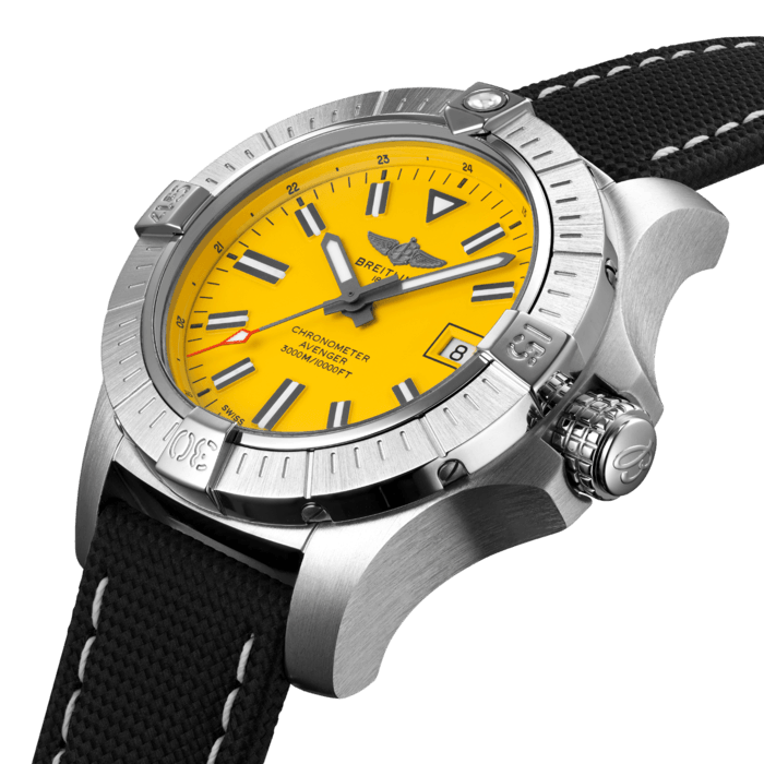 Bold, extremely robust and shock resistant, the Avenger Automatic 45 Seawolf is a pilots’ watch prepared for adventures well below the ocean’s surface (up to 300 bars - 3.000m). As a true Breitling Avenger, it can be used wearing gloves and offers unrivalled safety and reliability to any airborne adventurer. The Avenger Automatic 45  Seawolf features a sturdy 45mm stainless-steel case, striking yellow dial and a choice of a stainless-steel bracelet, or black military leather strap that fits either a stainless-steel pin buckle or folding clasp. With an impressive water resistance, the Seawolf is at ease up in the air and deep down the oceans. Thanks to its rugged bezel and its special grip-pattern on the crown, the Avenger Automatic 45 Seawolf can be easily operated wearing gloves.