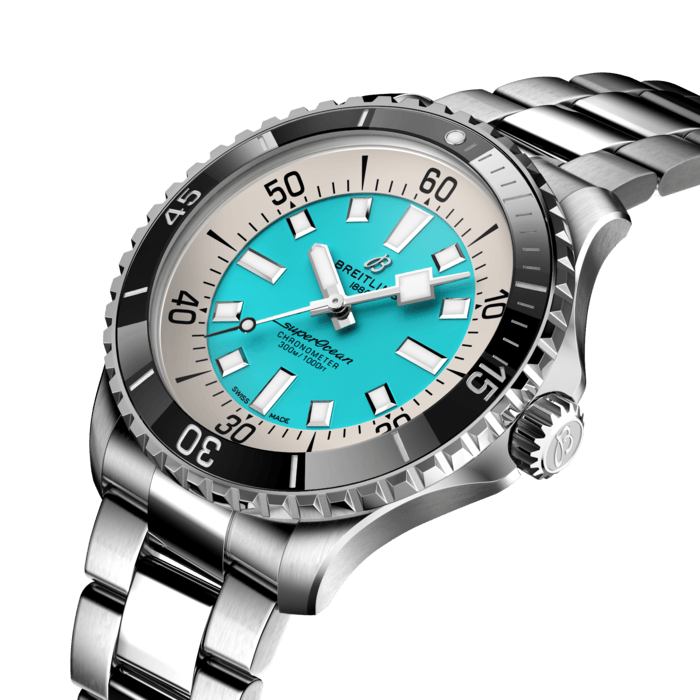 Performance and style for all your water-based pursuits.
In the 1960s, the new sport of scuba diving was all the rage. For divers, timing was everything, and Breitling set out to give them the most clear-cut dive watch possible by eliminating any feature that didn’t support their lifesaving needs underwater. This pared-down watch was named the Slow Motion. What remained were clean lines, chunky luminescent indexes, squared-off hands and a high-contrast dial ring, all aimed at maximum legibility. Practical, yes. But what people really fell in love with was the look.
The new Superocean retraces the Slow Motion's celebrated design codes, while adding modern features, like a ceramic-inlayed bezel and brightly colored dials. Broad hands and indexes in luminescent Super-LumiNova® allow for easy readability underwater. The watch is water resistant to 300 m (1000 ft), as well as being shock-, sand- and saltwater-resistant. The bronze version uses a special alloy that has excellent resistance to corrosion, yet will still develop a subtle patina over time that makes the watch even more unique. The two strap options (rubber and metal bracelet) have a folding clasp that allows for micro-adjustments of up to 15 mm for easy wear over rashies and wetsuits. Its scratch-proof ceramic inlayed bezel will never wear or fade. For safety, the bezel is uni-directional on most sizes and bi-directional with a patented lock on the 46 mm.
Best of all, this is no longer strictly a dive watch—surf with it, swim with it, hit the beach bar with it, then wear it out to dinner. The Superocean perfectly balances the nostalgia of its heritage with a fresh new look.