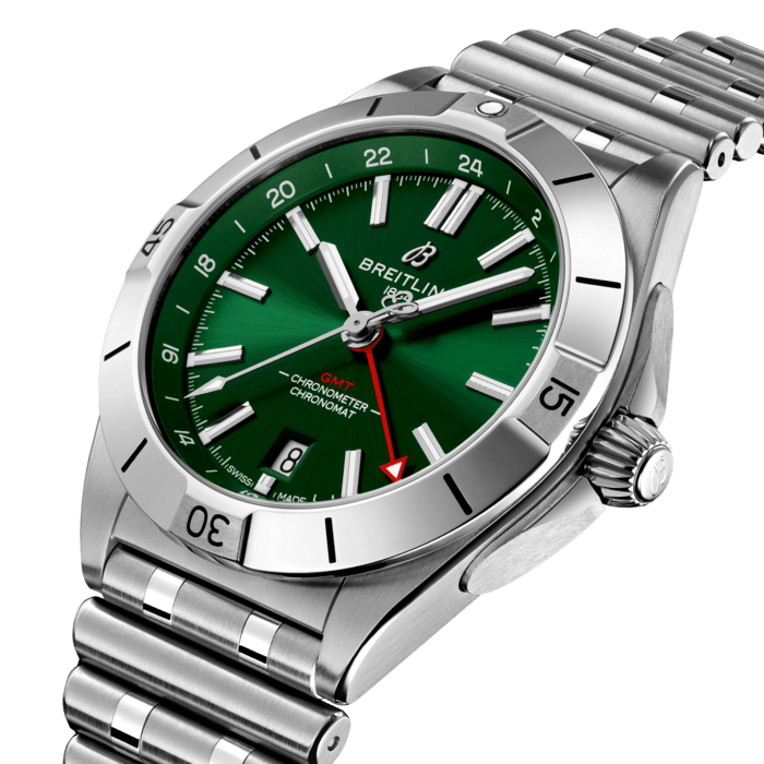The Chronomat Automatic GMT 40 is Breitling’s tribute to travel, not only for its dual time zone display, but also because of its easygoing aesthetics. Subtle dial colors, combined with an all-steel case and bracelet, work with any wardrobe. Meanwhile, the tone-on-tone 24-hour scale lets the red GMT hand speak for itself.
The Breitling Caliber 32 powers the GMT complication. Its 24-hour scale lets the user track a second time zone and know at a glance whether it’s day or night, while the “onion” crown (a classic Chronomat feature named for its fluted-dome shape) allows for easy adjustments. As an all-purpose sports watch, meant to cross over between Breitling’s air, land and sea universes, the GMT 40 has an impressive 200m water resistance.
Known as “a watch for every pursuit,” the Chronomat mission is truer now than ever because of the GMT 40’s practical size and understated style. Sturdy enough for the gym, yet smart enough for black tie: If there’s one watch to travel with, this is it.
