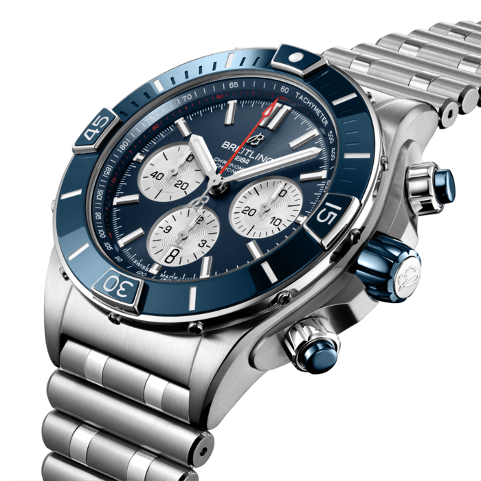 Breitling’s supercharged watch for your every pursuit.
The Super Chronomat is inspired by the original 1980s Chronomat that Breitling created for the hotshots of aerobatic squadrons. The boldest of all Chronomat watches, the Super Chronomat features several ceramic inserts – on the bezel, on the chronograph pushers and on the crown – as well as a Rouleaux-inspired rubber strap. Still, this all-purpose sports watch won’t get in the way of your sense of style.
The Super Chronomat comes in several colour and metal variations, from stainless steel to 18 k red gold. It either features the iconic Rouleaux bracelet or a rubber Rouleaux-inspired strap, matched with a folding clasp. The Super Chronomat B01 44 is powered by the Breitling Manufacture Calibre 01, a COSC-certified chronometer.