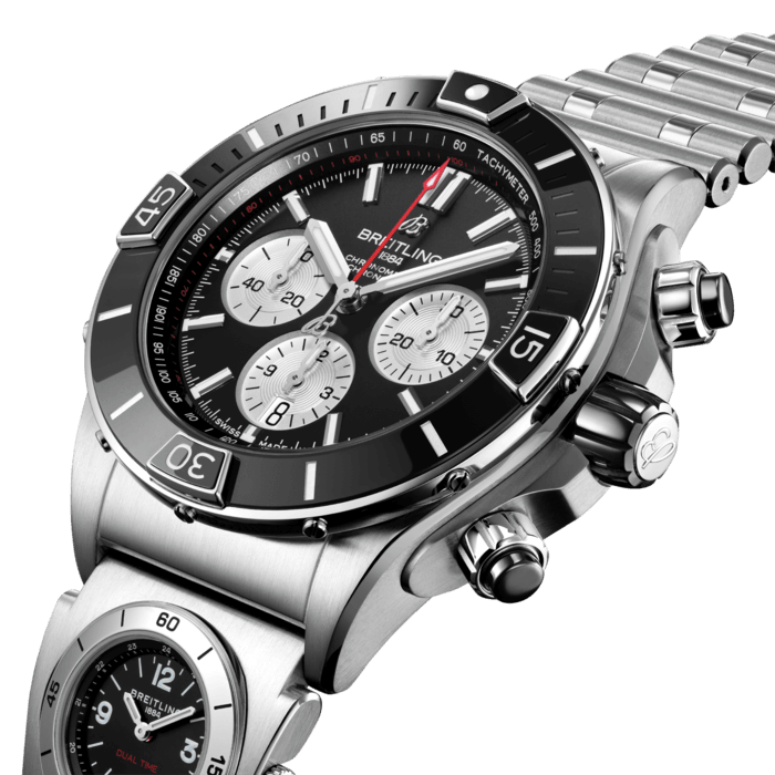 Breitling’s supercharged watch for your every pursuit.
The Super Chronomat is inspired by the original 1980s Chronomat that Breitling created for the hotshots of aerobatic squadrons. The boldest of all Chronomat watches, the Super Chronomat features several ceramic inserts – on the bezel, on the chronograph pushers and on the crown – as well as a Rouleaux-inspired rubber strap. Also, a UTC module is embedded in the Rouleaux bracelet. UTC stands for Coordinated Universal Time, and it provides a way to keep track of a second time zone and is a quirky Breitling feature dating back to the 1980s.
Still, this all-purpose sports watch won’t get in the way of your sense of style.
The Super Chronomat comes in several colour and metal variations, from stainless steel to 18 k red gold. It either features the iconic Rouleaux bracelet or a rubber Rouleaux-inspired strap, matched with a folding clasp. The Super Chronomat B01 44 is powered by the Breitling Manufacture Calibre 01, a COSC-certified chronometer.