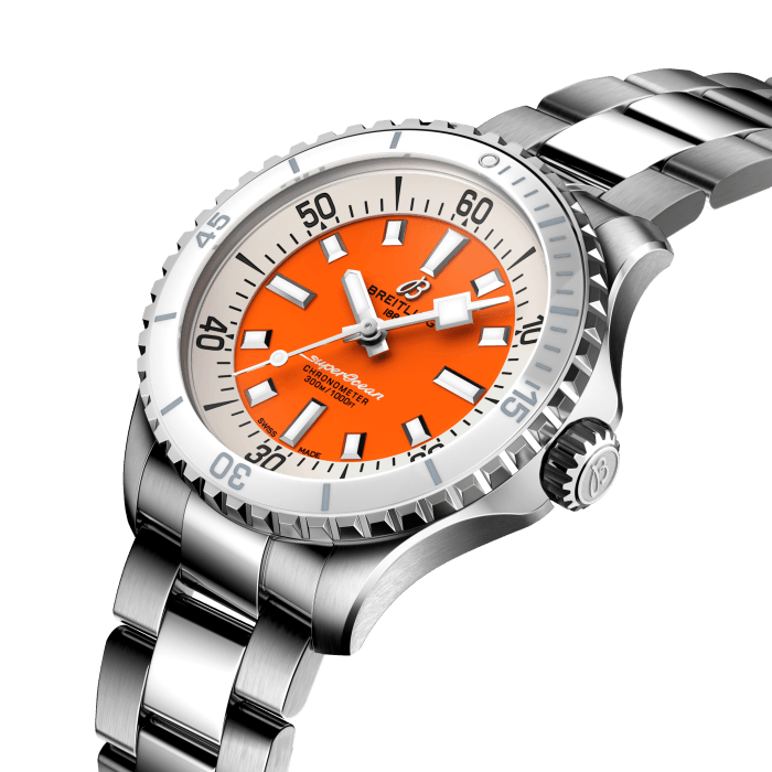 Performance and style for all your water-based pursuits.
In the 1960s, the new sport of scuba diving was all the rage. For divers, timing was everything, and Breitling set out to give them the most clear-cut dive watch possible by eliminating any feature that didn’t support their lifesaving needs underwater. This pared-down watch was named the Slow Motion. What remained were clean lines, chunky luminescent indexes, squared-off hands and a high-contrast dial ring, all aimed at maximum legibility. Practical, yes. But what people really fell in love with was the look.
The new Superocean retraces the Slow Motion's celebrated design codes, while adding modern features, like a ceramic-inlayed bezel and brightly colored dials. Broad hands and indexes in luminescent Super-LumiNova® allow for easy readability underwater. The watch is water resistant to 300 m (1000 ft), as well as being shock-, sand- and saltwater-resistant. The bronze version uses a special alloy that has excellent resistance to corrosion, yet will still develop a subtle patina over time that makes the watch even more unique. The two strap options (rubber and metal bracelet) have a folding clasp that allows for micro-adjustments of up to 15 mm for easy wear over rashies and wetsuits. Its scratch-proof ceramic inlayed bezel will never wear or fade. For safety, the bezel is uni-directional on most sizes and bi-directional with a patented lock on the 46 mm.
Best of all, this is no longer strictly a dive watch—surf with it, swim with it, hit the beach bar with it, then wear it out to dinner. The Superocean perfectly balances the nostalgia of its heritage with a fresh new look.