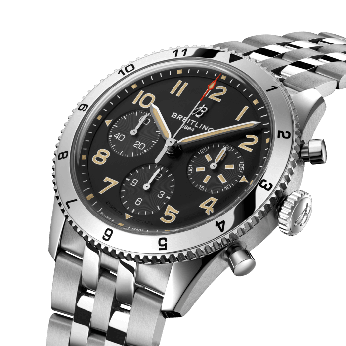 From brave first takeoffs to the birth of commercial air travel, Breitling’s history is inseparable from that of flight. In the 1930s, Breitling’s Huit Aviation department made its name inventing precision cockpit clocks. Two decades later, it introduced yet another novel flight instrument, this time in wearable form: the Ref. 765 AVI. That pioneering pilot’s watch provided the technical backdrop for today’s Classic AVI, a collection inspired by the rugged spirit of famed early aircraft.
The Classic AVI P-51 Mustang honors one of those legends. When the aircraft was built in a mere 120 days, even its developer North American Aviation, didn’t anticipate what a powerhouse it had on its hands. The P-51’s low-drag wings and engine-cooling system—considered experimental when the single-seat fighter first took off in 1940—gave it unprecedented speed and range. The addition of a Merlin engine, expanded the plane’s performance to high altitudes, making it the best all-purpose fighter of its time.
As a true pilot’s watch designed to withstand the rigors of a vintage cockpit, the Classic AVI P-51 Mustang features large, highly legible Arabic numerals on the dial and bezel.
The knurled bezel on the 42mm case provides optimal grip, even in a pilot’s gloved hands. Top-stitched calfskin straps give a nod to the seams found on classic flight gear, while the stainless-steel bracelet provides an elegant alternative. Pilots and other travelers will appreciate its legibility, wearability, and understated style. The engine of the Classic AVI is the COSC-certified Breitling Caliber 23 movement, which provides approximately 48-hours of power reserve.